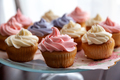 Organic homemade colorful cupcakes served on the plate for Birthday party in a selective focus - PhotoDune Item for Sale