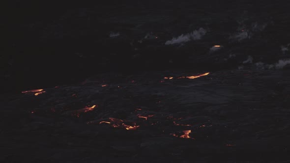 Glowing And Smoking Lava Flow From Erupting Fagradalsfjall Volcano