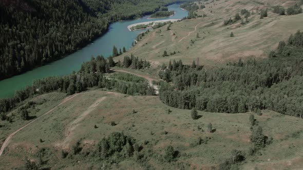 Aerial view from on valley and mountains of Ak-Kem with river Katun in Altai