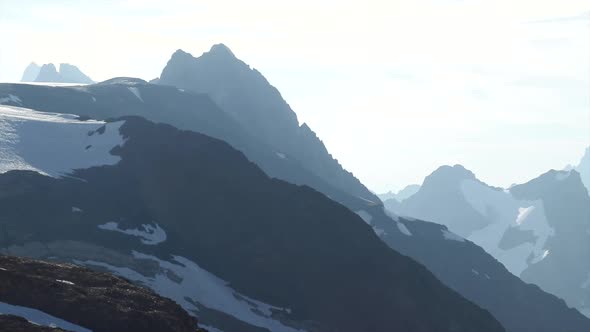 Smooth pan of the French Alps sky line at sunrise, Les Deux Alpes. Pro Res