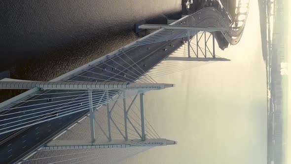 Vertical Drone View of Cars Riding on Steel Urban Bridge