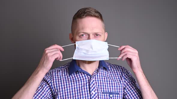 A man wears a medical mask to protect against covid-19. epidemic and viruses