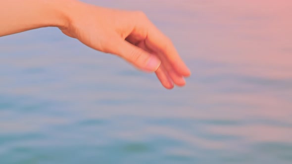 Hand Against Sea Makes Wave Movements, Summer Vacation and Swimming Concept