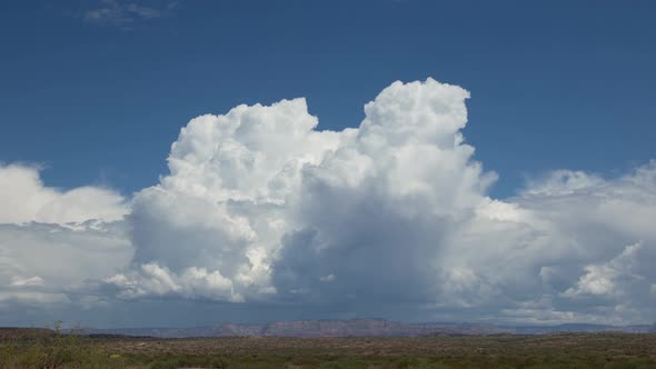 Bubbling Cumulus Clouds in High Desert Landscape Close Up Timelapse