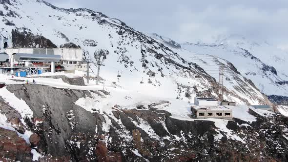 Ski Resort with Poma Lift on Snowy Mountain Slope in Winter