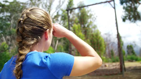 Tired woman standing in boot camp 4k