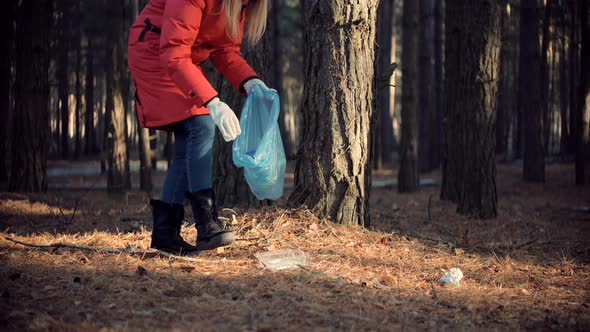 Picking Tidying Trash Recycling. Cleaner Woman Collecting Trash In Forest. Trash Volunteer Εco.