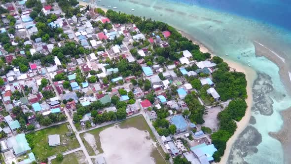 Aerial drone texture of marine resort beach by sea with sand background