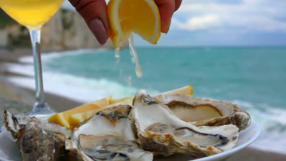 Lemon Squeezed Onto Fresh Oysters