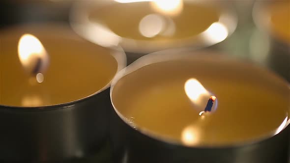 Relaxing Atmosphere and Burning Candles at Massage Room in Spa Salon, Closeup