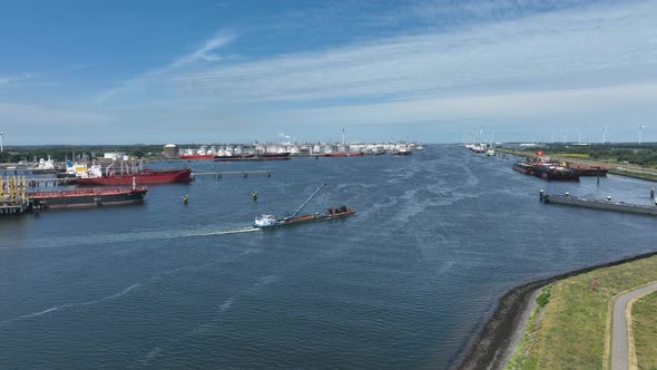 A Cargo Barge Moves Construction Equipment Aerial View