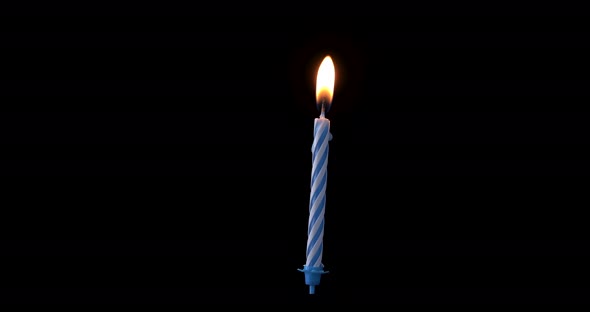 Realistic full-sized single blue birthday candlelight isolated on black background. 