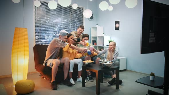 Best Friends Making Video By Smartphone While Making a Toast with Dry Ice Cocktails