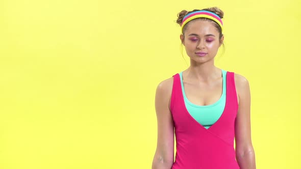 Retro Portrait of Beautiful Adult Girl in Colorful Sportswear Lifting Weights While Doing Fitness in