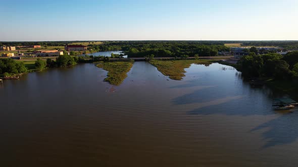 Aerial footage of Cedar Creek Lake in Texas.  Camera is flying north near Gun Barrel City