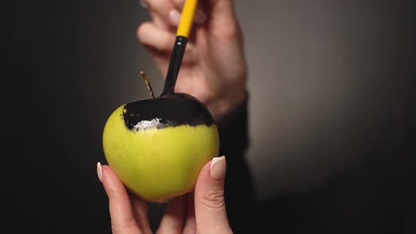 Girl Dyes an Apple