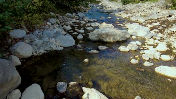 steep green mountains, deep forest and mountain road, beautiful valley and river