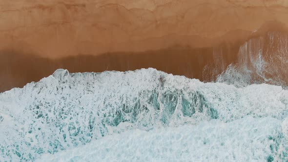 Seascape with Ocean Waves Rolling on Empty Beach Upper View