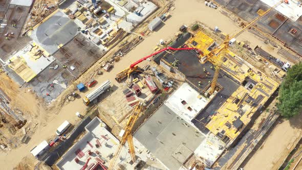 Aerial view of a new house building on a construction site.