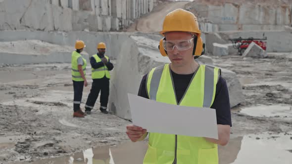 Male Supervisor Looking at Camera in Granite Quarry