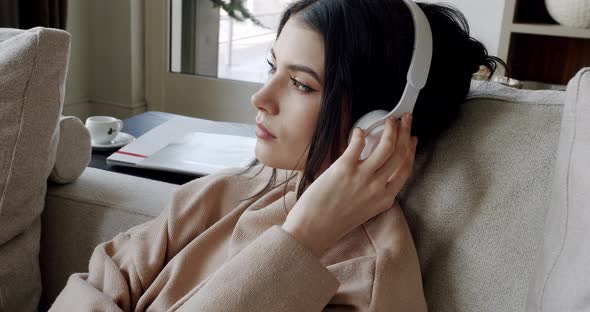 Pretty Lady Enjoys Listening Chill Music Audio Sound Meditating at Home