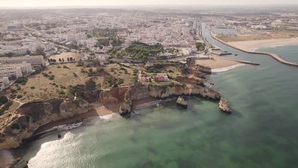 Panoramic view of Algarve rocky coast and sand beaches, Lagos, Portugal. Scenic aerial