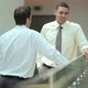 Businessmen shaking hands in office - VideoHive Item for Sale