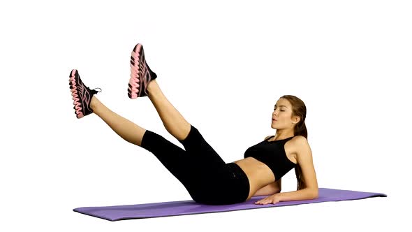 Woman Doing Strength Exercises for Abdominal Muscles, Gym. White Background