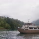Pleasure Boat on Lake Como on a Cloudy Day - VideoHive Item for Sale