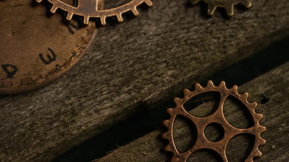 Rotating stock footage shot of antique and weathered watch faces 