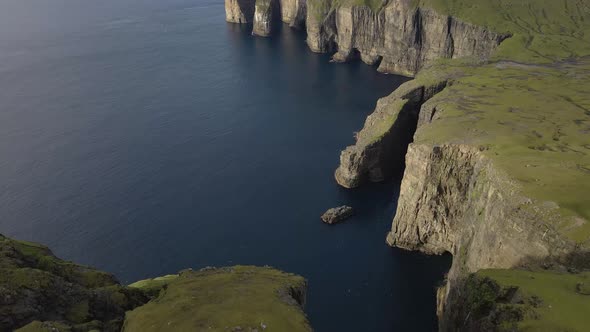 Drone Along Coastline To Asmundarstakkur Sea Stack