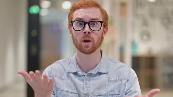 Portrait of Angry Casual Redhead Man Arguing, Fighting 