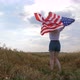 Happy Patriotic Young Woman Waves the US Flag and Jumps Into the Field - VideoHive Item for Sale