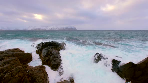 Norwegian Sea waves on rocky coast of Lofoten islands, Norway