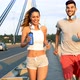 Attractive Man and Beautiful Woman Jogging Together - VideoHive Item for Sale