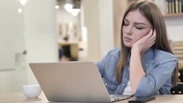 Tired Creative Woman Sleeping at Work in Office