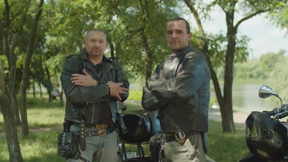 Serious Male Riders Greeting in Bikers Style