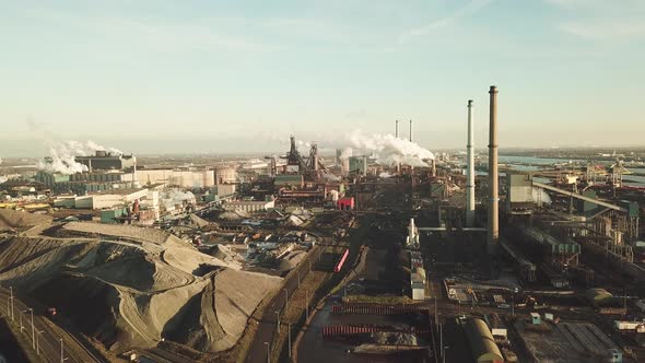 Aerial view of factory Tata Steel with smoking chimneys in Holland