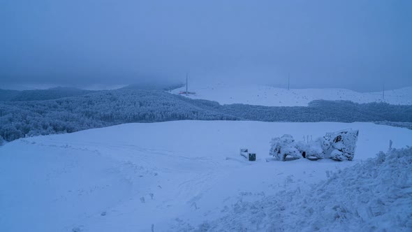 Blue morning in winter mountain