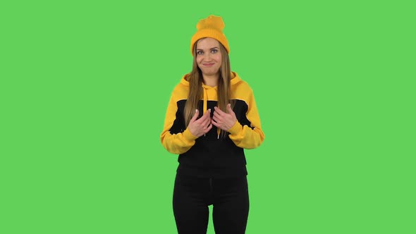 Modern Girl in Yellow Hat Is Pointing Herself, Say Who Me No Thanks i Do Not Need. Green Screen