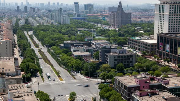 Suzhou Buildings Surround Big Green Park in China Timelapse