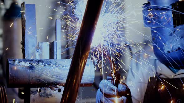 Welder welding a metal