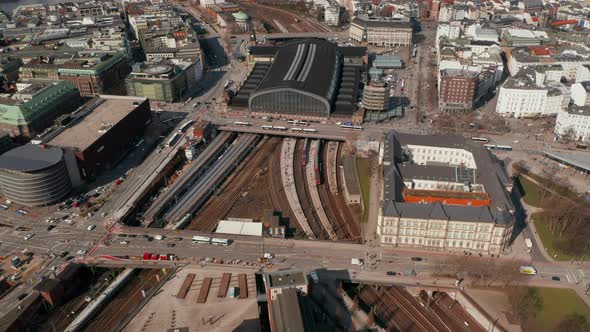 Aerial View of Trains Arriving at Hamburg Main Train Station in Urban City Center