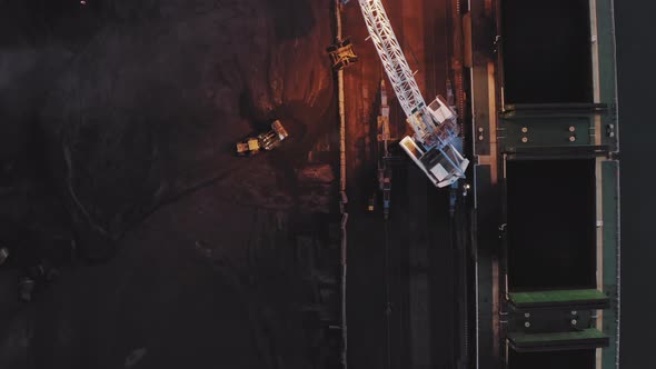 View From the Drone Vertically Down to the Loading of Coal on the Ship