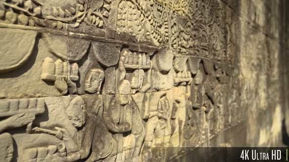 4K Close-up Ornate Details of Ancient Stone Bas-Relief in a Temple in Angkor, Cambodia