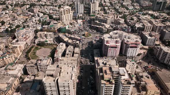 An aerial view of a city and its buildings, road and architecture in Karachi. It looks amazing