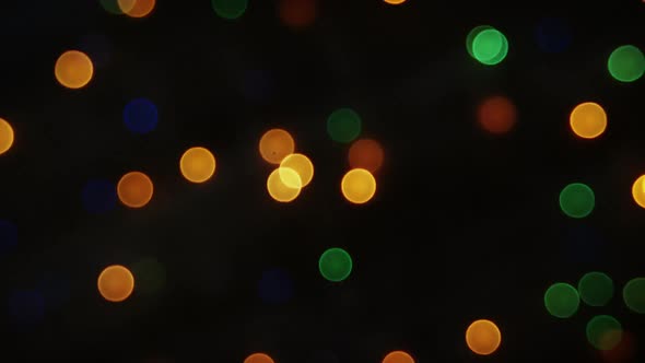 Bokeh of colorful christmas lights glowing