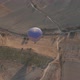 Hot Air Balloon with Large Blue Dome Flies Over Fields - VideoHive Item for Sale