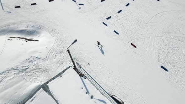 Aerial Top View of a Participant in a Biathlon Race