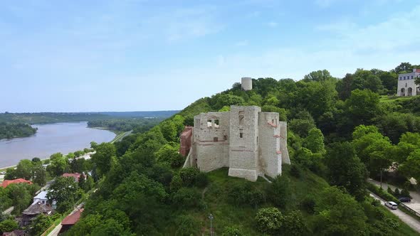 Zoom Shot of Historical Building Situated on Green Hill